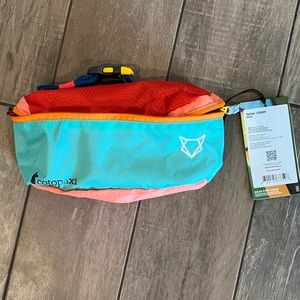 Cotopaxi hip pack in fun bright colors